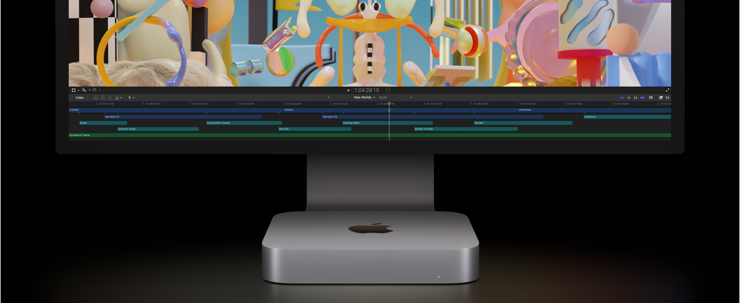 Mac mini og Studio Display sett forfra som viser et videoredigeringsprosjekt i Final Cut Pro.