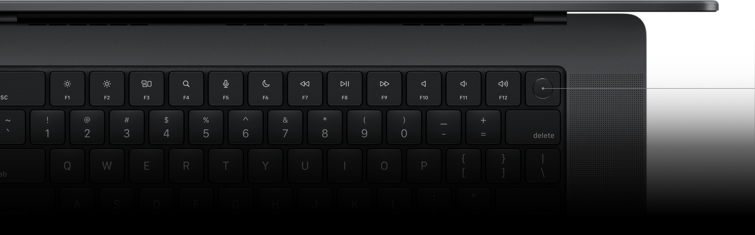 En peker viser Touch ID-tasten på Magic Keyboard.